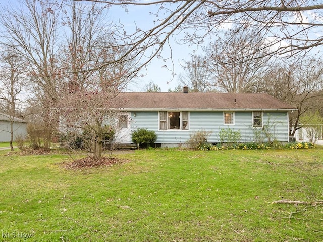 exterior space with a yard