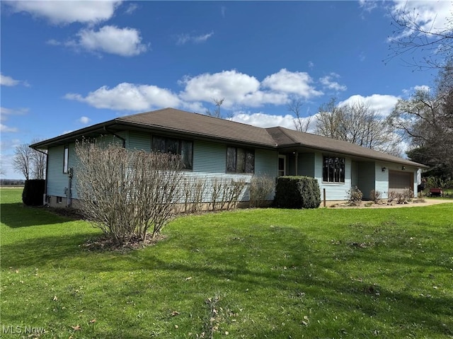 591 N Smyser Rd, Wooster, OH 44691 - view of front of home with an attached garage and a front yard