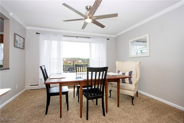 31 Morgan Ave, Ashland, OH 44805 - dining room with light carpet, ornamental molding, baseboards, and ceiling fan