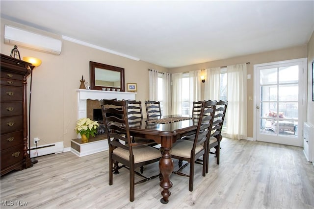 31 Morgan Ave, Ashland, OH 44805 - dining space with light wood finished floors, a wall mounted AC, baseboards, and baseboard heating