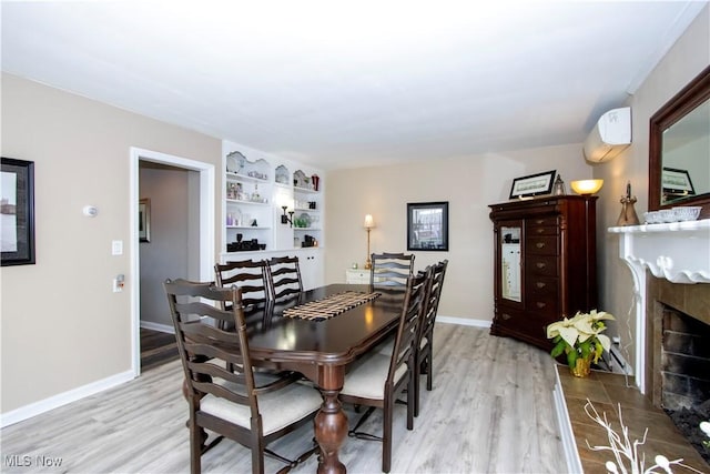 31 Morgan Ave, Ashland, OH 44805 - dining space with wood finished floors, a fireplace, and baseboards