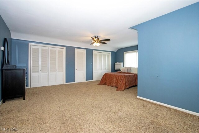 31 Morgan Ave, Ashland, OH 44805 - bedroom with carpet flooring, baseboards, a ceiling fan, and multiple closets