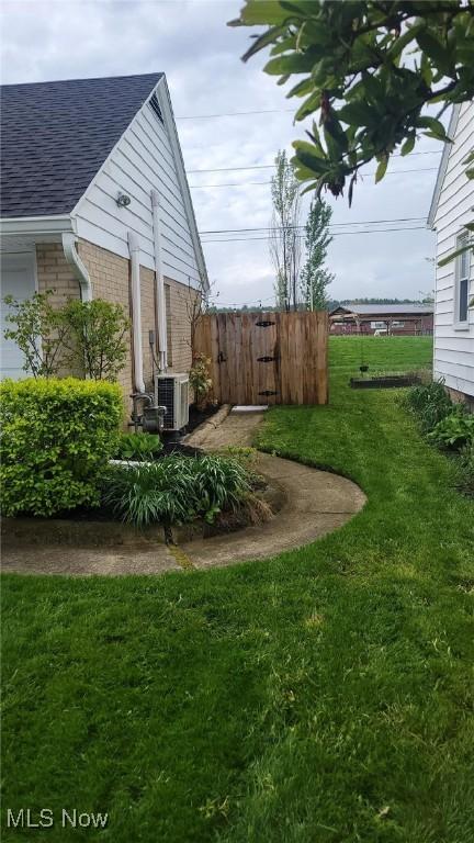 31 Morgan Ave, Ashland, OH 44805 - view of yard featuring fence and central AC