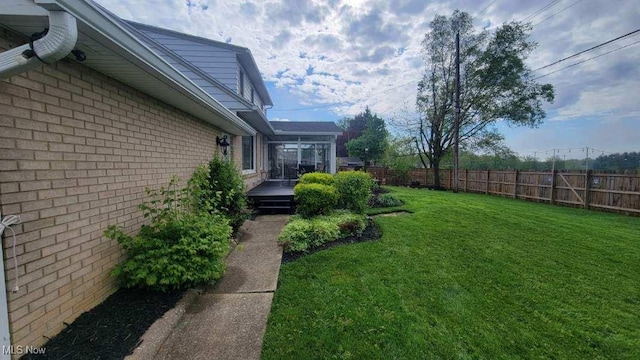 31 Morgan Ave, Ashland, OH 44805 - view of yard featuring a deck and a fenced backyard