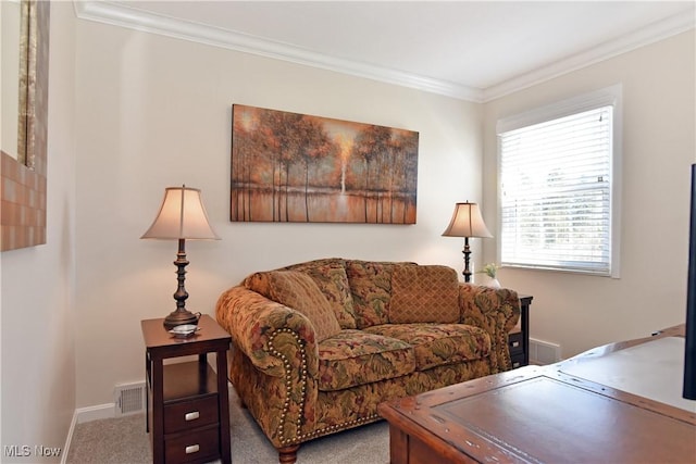 living room featuring ornamental molding, baseboards, carpet, and visible vents