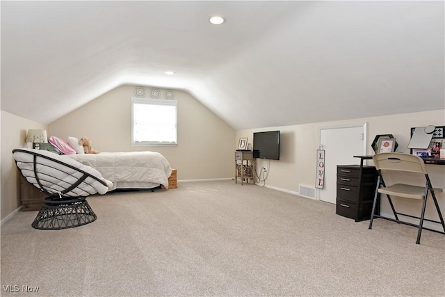 bedroom with visible vents, baseboards, vaulted ceiling, and carpet floors
