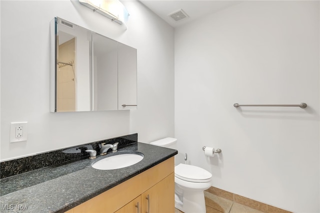 2077 E 4th St E Unit 4E, Cleveland, OH 44115 - bathroom featuring toilet, tile patterned floors, vanity, and visible vents