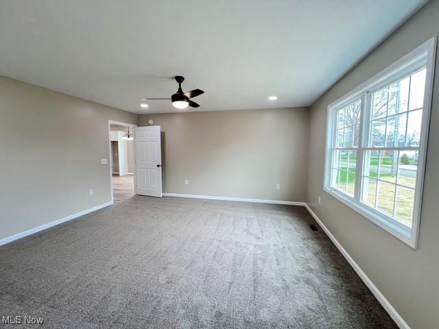 unfurnished room featuring recessed lighting, baseboards, and carpet floors