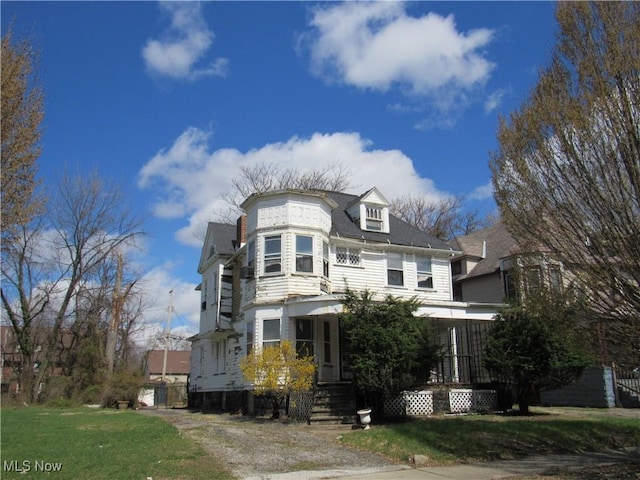 1831 Knowles St, East Cleveland, OH 44112 - view of front of property featuring a front lawn
