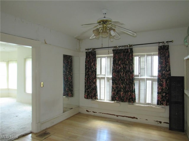 1831 Knowles St, East Cleveland, OH 44112 - unfurnished room featuring wood finished floors, a ceiling fan, and visible vents