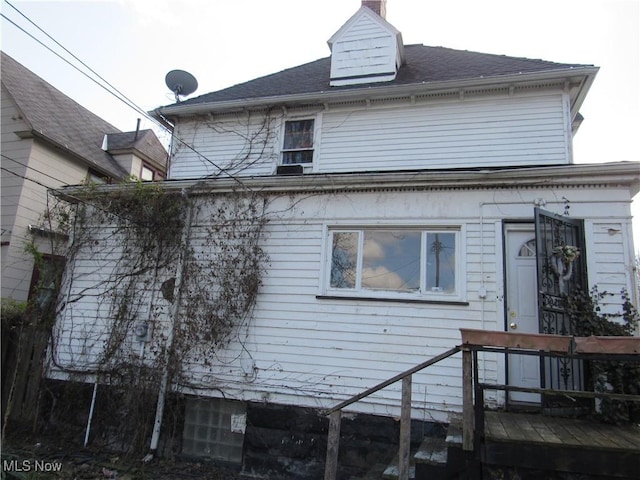 1831 Knowles St, East Cleveland, OH 44112 - back of house featuring a chimney