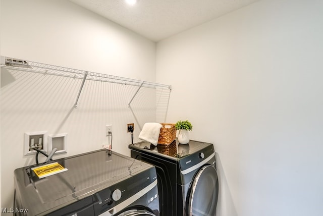 835-2 Dipper Ln, Aurora, OH 44202 - washroom with separate washer and dryer