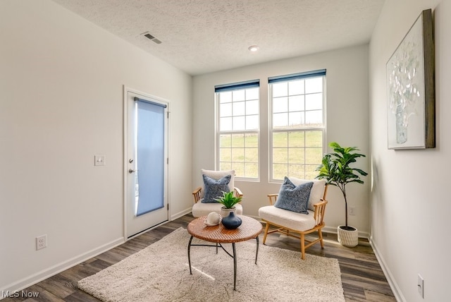 835-2 Dipper Ln, Aurora, OH 44202 - living area with wood finished floors and a textured ceiling