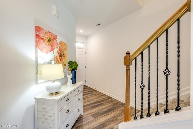 835-2 Dipper Ln, Aurora, OH 44202 - foyer featuring stairs, dark wood finished floors, and recessed lighting