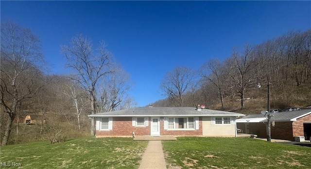 36577 State Route 7, Sardis, OH 43946 - ranch-style home with brick siding and a front lawn