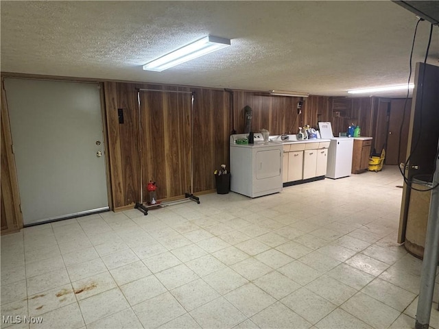 36577 State Route 7, Sardis, OH 43946 - finished basement featuring wood walls, independent washer and dryer, a textured ceiling, and light floors