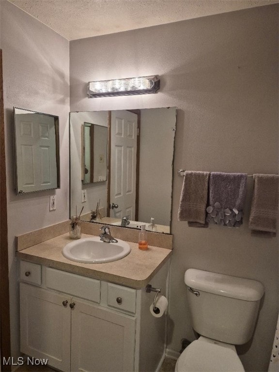 2004 Stoney Run Cir, Broadview Heights, OH 44147 - bathroom featuring vanity and a textured ceiling