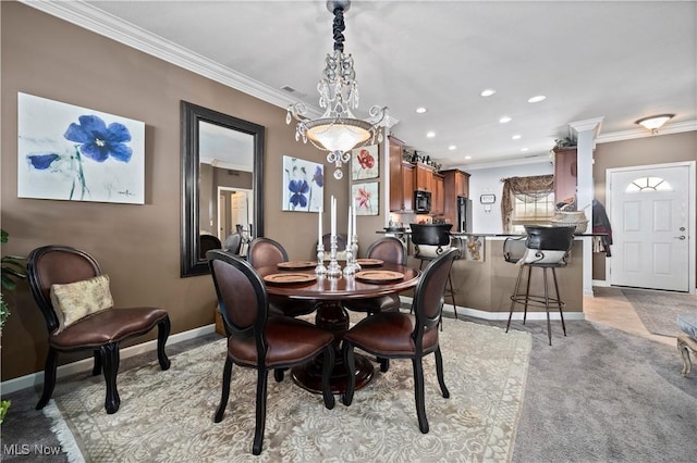 dining space featuring visible vents, baseboards, recessed lighting, light colored carpet, and crown molding