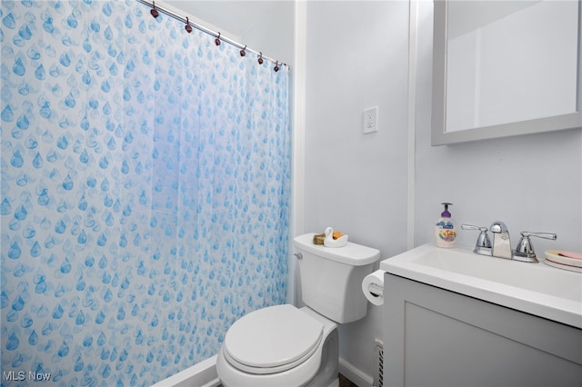 14117 Sylvia Ave, Cleveland, OH 44110 - bathroom with toilet, curtained shower, and vanity
