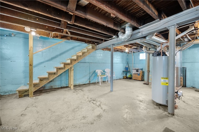 14117 Sylvia Ave, Cleveland, OH 44110 - basement with stairway and gas water heater