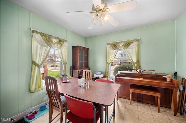 14117 Sylvia Ave, Cleveland, OH 44110 - dining area with ceiling fan and a healthy amount of sunlight
