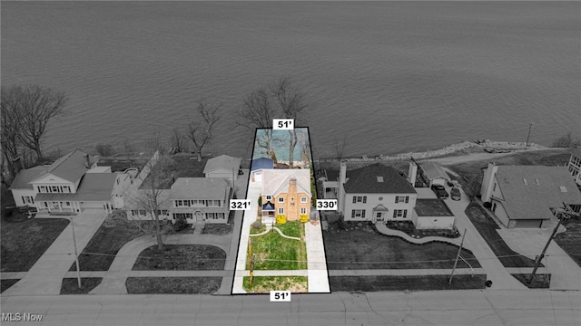 aerial view of residential area featuring property parcel outlined