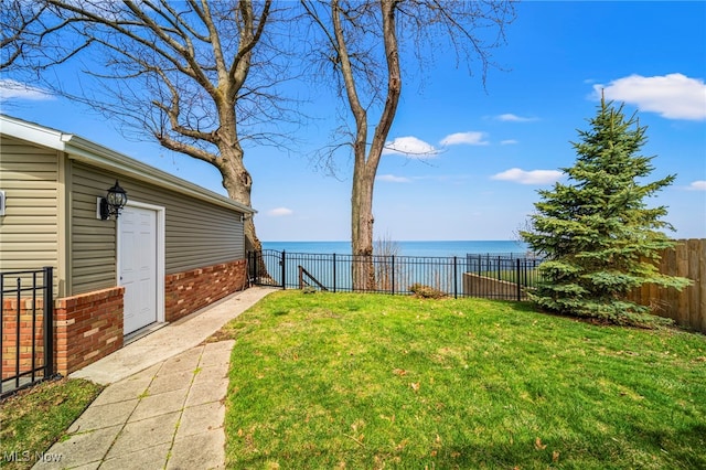 view of yard with a water view