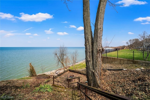 water view featuring fence