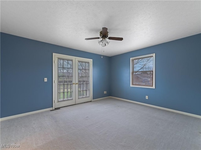 101 Keyser St, Marietta, OH 45750 - carpeted spare room featuring french doors, ceiling fan, baseboards, and plenty of natural light
