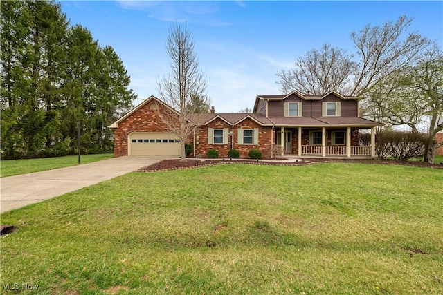 101 Keyser St, Marietta, OH 45750 - view of front facade featuring an attached garage, covered porch, concrete driveway, and a front lawn