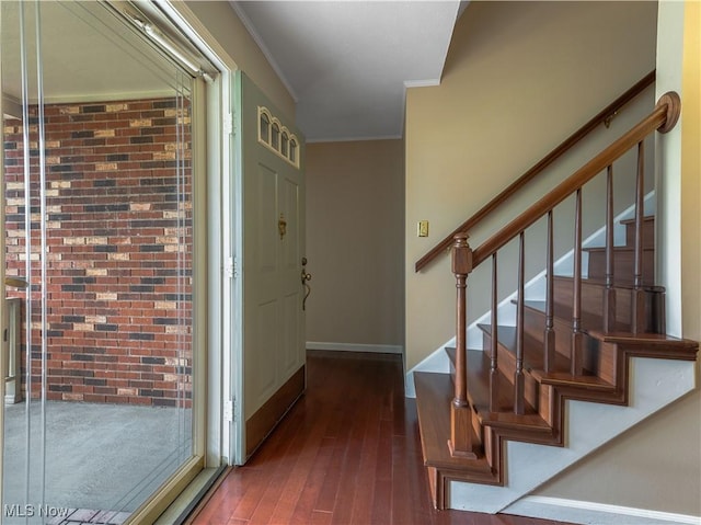 101 Keyser St, Marietta, OH 45750 - entryway featuring baseboards, stairway, hardwood / wood-style flooring, and crown molding