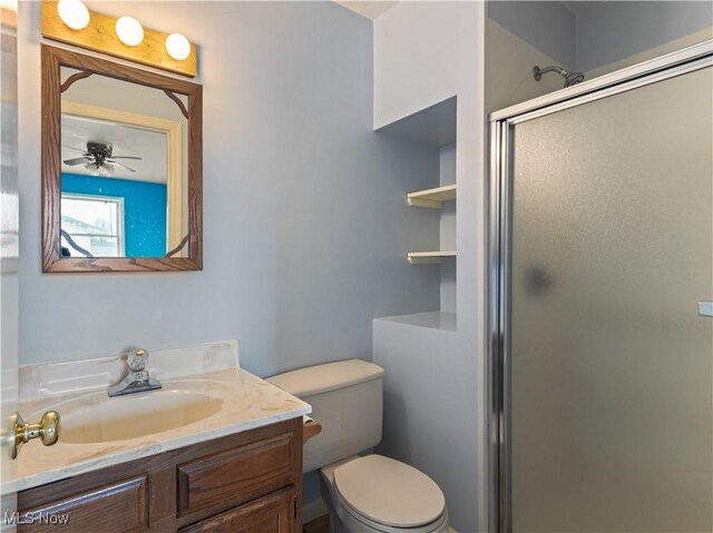 101 Keyser St, Marietta, OH 45750 - bathroom featuring toilet, a stall shower, and vanity