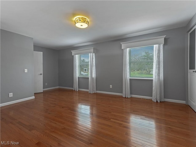 101 Keyser St, Marietta, OH 45750 - empty room featuring baseboards and wood finished floors