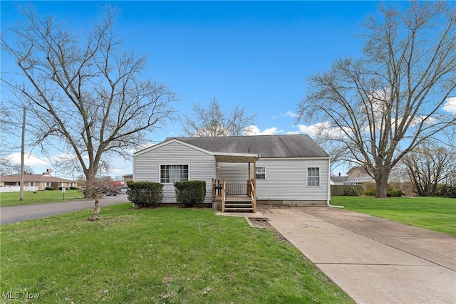 2216 34th St NE, Canton, OH 44705 - view of front of property featuring driveway and a front lawn