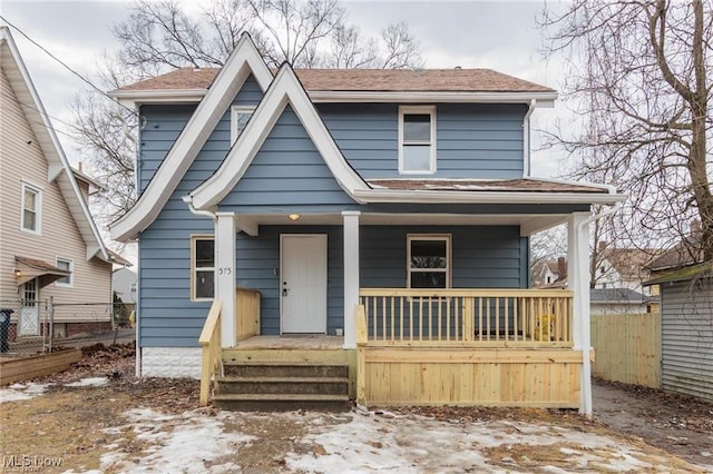 575 Fernwood Dr, Akron, OH 44320 - view of front of house with a porch and fence