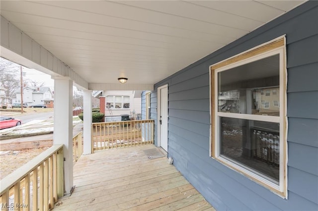 575 Fernwood Dr, Akron, OH 44320 - wooden deck with covered porch