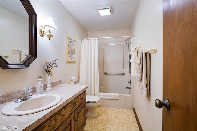 bathroom featuring toilet, a textured ceiling, vanity, and shower / tub combo
