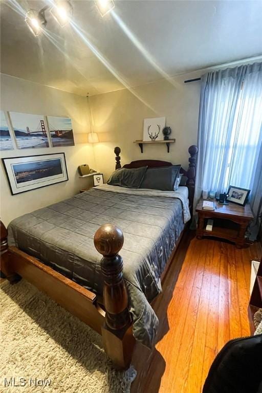 bedroom featuring hardwood / wood-style flooring