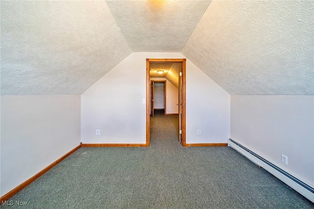 2457 Sheffield Rd, Jefferson, OH 44047 - bonus room with a baseboard heating unit, a textured ceiling, carpet, baseboards, and vaulted ceiling