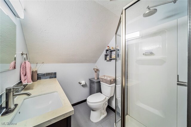 2457 Sheffield Rd, Jefferson, OH 44047 - bathroom featuring a shower stall, a textured ceiling, toilet, lofted ceiling, and vanity