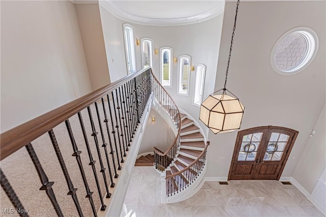 3377 E Galloway Dr, Richfield, OH 44286 - entrance foyer with marble finish floor, a towering ceiling, ornamental molding, and baseboards