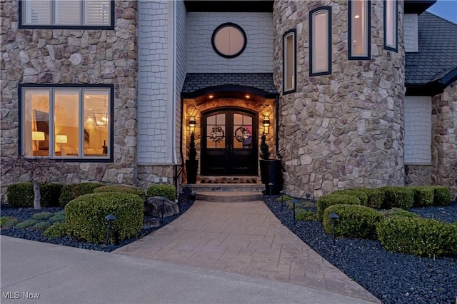 3377 E Galloway Dr, Richfield, OH 44286 - view of exterior entry featuring french doors and stone siding
