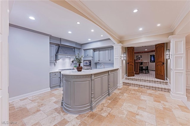 3377 E Galloway Dr, Richfield, OH 44286 - kitchen featuring premium range hood, light countertops, gray cabinetry, stainless steel gas stovetop, and stone tile floors