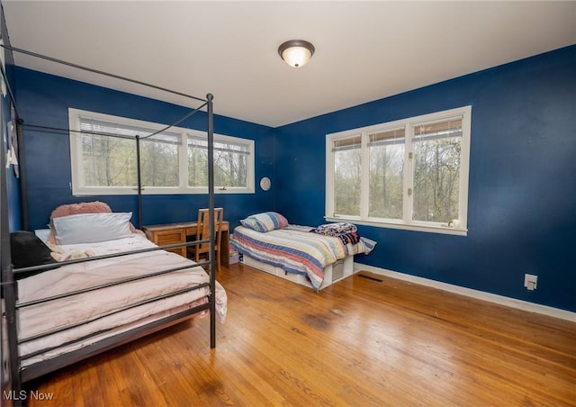 100 Crestwood Cir, Marietta, OH 45750 - bedroom with wood finished floors and baseboards