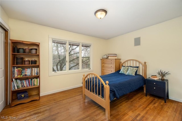 100 Crestwood Cir, Marietta, OH 45750 - bedroom with wood finished floors and baseboards