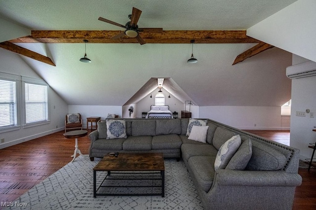 living room with lofted ceiling with beams, wood finished floors, baseboards, and a ceiling fan