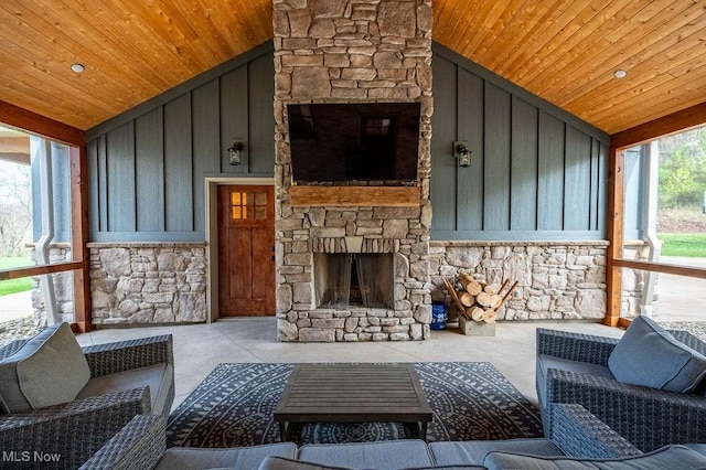 exterior space with an outdoor living space with a fireplace