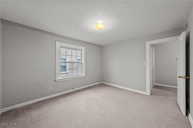 2484 Eaton Rd, University Heights, OH 44118 - spare room with carpet and baseboards