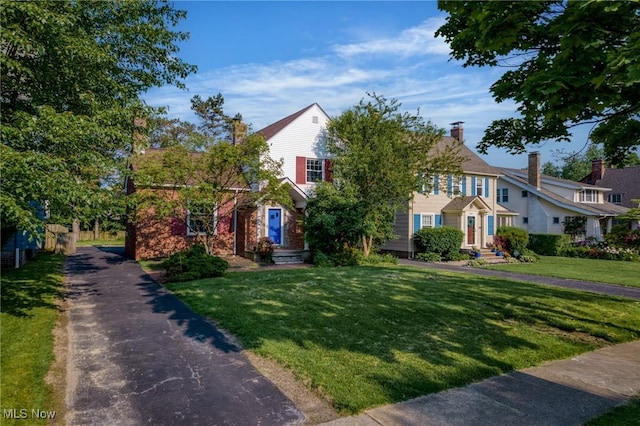 2484 Eaton Rd, University Heights, OH 44118 - obstructed view of property with a front lawn