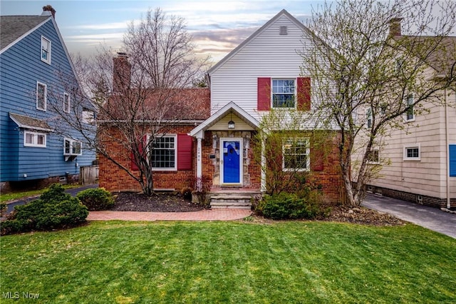2484 Eaton Rd, University Heights, OH 44118 - view of front of property featuring a front lawn and brick siding